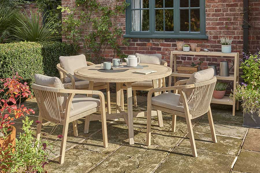 Kettler Cora 4 seat round wooden garden dining set with rope back dining armchairs