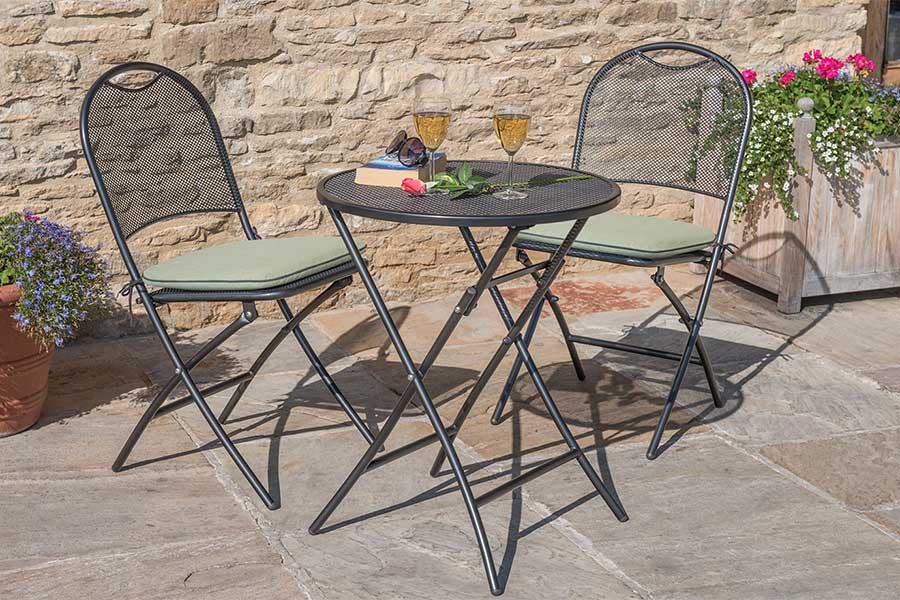 Small Cafe Roma patio dining set with small round table and seat cushions