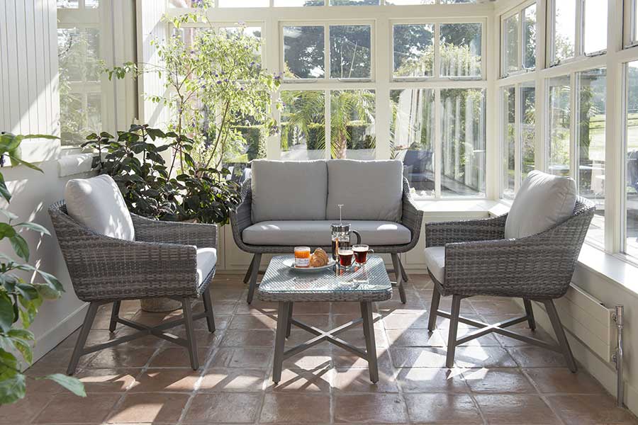 Kettler LaMode wicker outdoor lounge set in a conservatory 