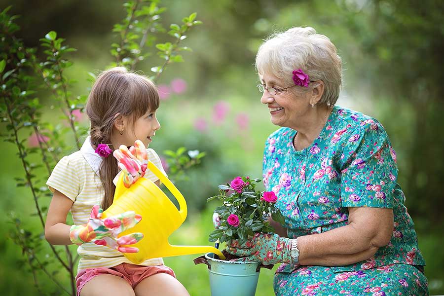 Child gardening with Grandmother